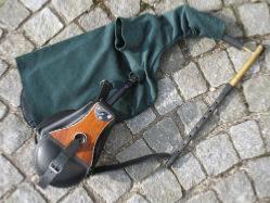A Full set of Irish Uilleann Practice Bagpipes with a set of bellows and a green bag cover - Bagpipes Galore